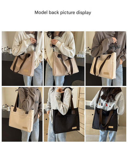 Stylish khaki canvas tote bag with detachable shoulder strap