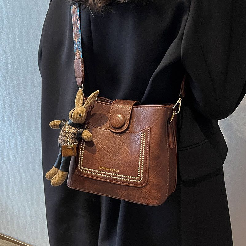 Vintage Style PU Leather Bucket Bag with Wide Patterned Strap & Optional Bunny Charm(red brown)