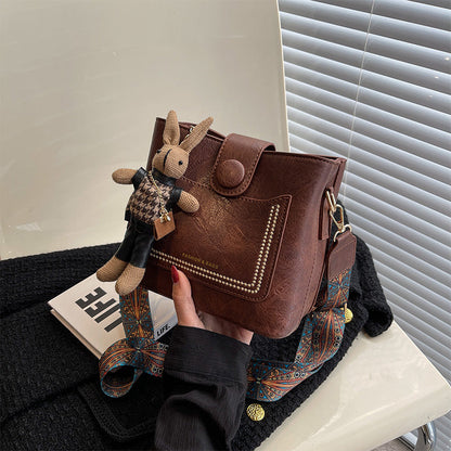Vintage Style PU Leather Bucket Bag with Wide Patterned Strap & Optional Bunny Charm(caramel)