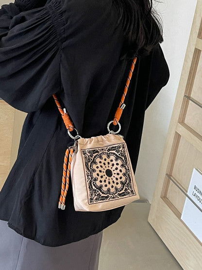 Chic Drawstring Bucket Bag with Intricate Print - Adjustable Rope Strap, Lightweight Fabric(Black)