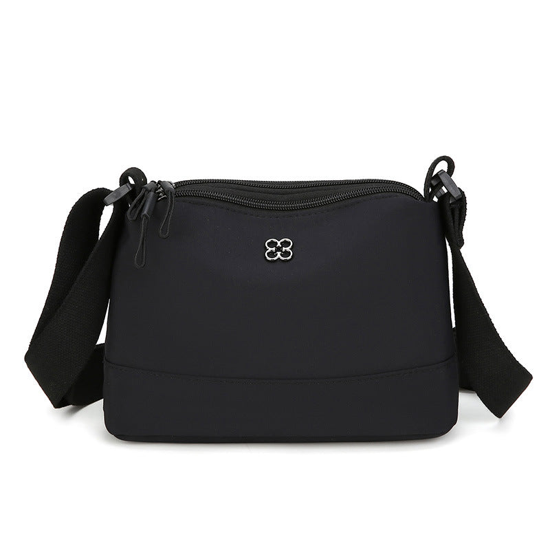Black Lightweight Multi-Layer Crossbody Bag for Women â€“ Compact, Water-Resistant Nylon Shoulder Bag with Adjustable Strap