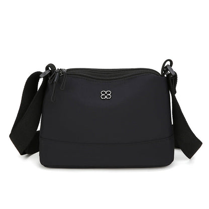 Black Lightweight Multi-Layer Crossbody Bag for Women â€“ Compact, Water-Resistant Nylon Shoulder Bag with Adjustable Strap
