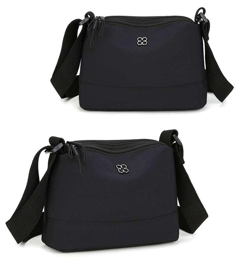 Black Lightweight Multi-Layer Crossbody Bag for Women â€“ Compact, Water-Resistant Nylon Shoulder Bag with Adjustable Strap
