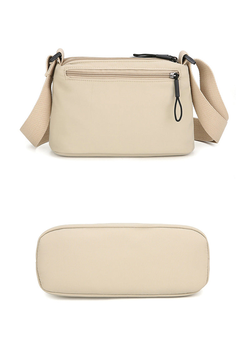 Black Lightweight Multi-Layer Crossbody Bag for Women â€“ Compact, Water-Resistant Nylon Shoulder Bag with Adjustable Strap