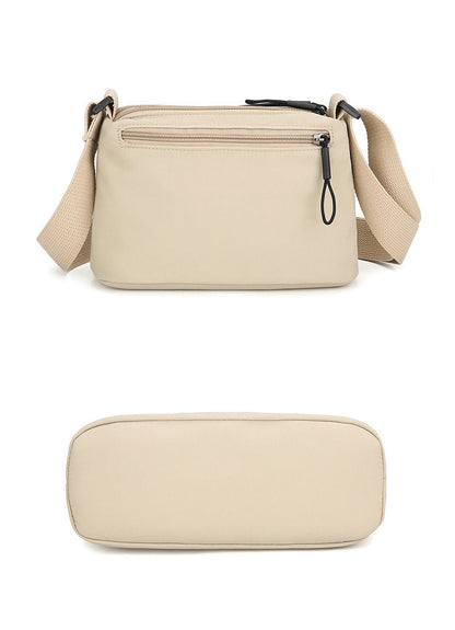 Black Lightweight Multi-Layer Crossbody Bag for Women â€“ Compact, Water-Resistant Nylon Shoulder Bag with Adjustable Strap