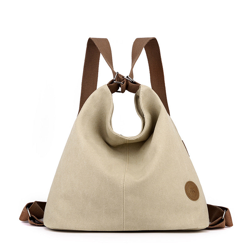 Khaki Versatile 3-in-1 Canvas Backpack and Shoulder Bag Large Capacity Handbag for Women Ideal for Travel School and Everyday Use