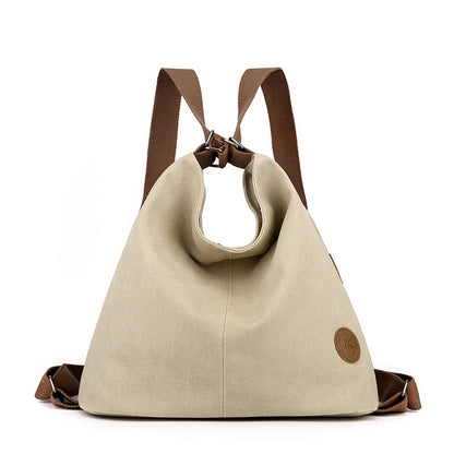 Khaki Versatile 3-in-1 Canvas Backpack and Shoulder Bag Large Capacity Handbag for Women Ideal for Travel School and Everyday Use