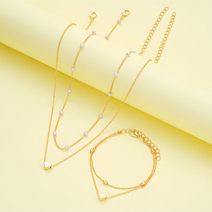 Gold Double-Layer Heart Charm Necklace and Bracelet Set – Women’s Layered Jewelry Set