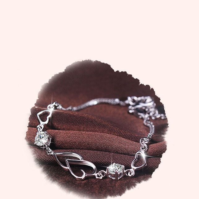 Heart-to-Heart Silver Plated Bracelet with Sparkling Rhinestones Elegant Romantic Jewelry for Women Includes Local Standard Gift Box for Special Occasions(Heart Brand)
