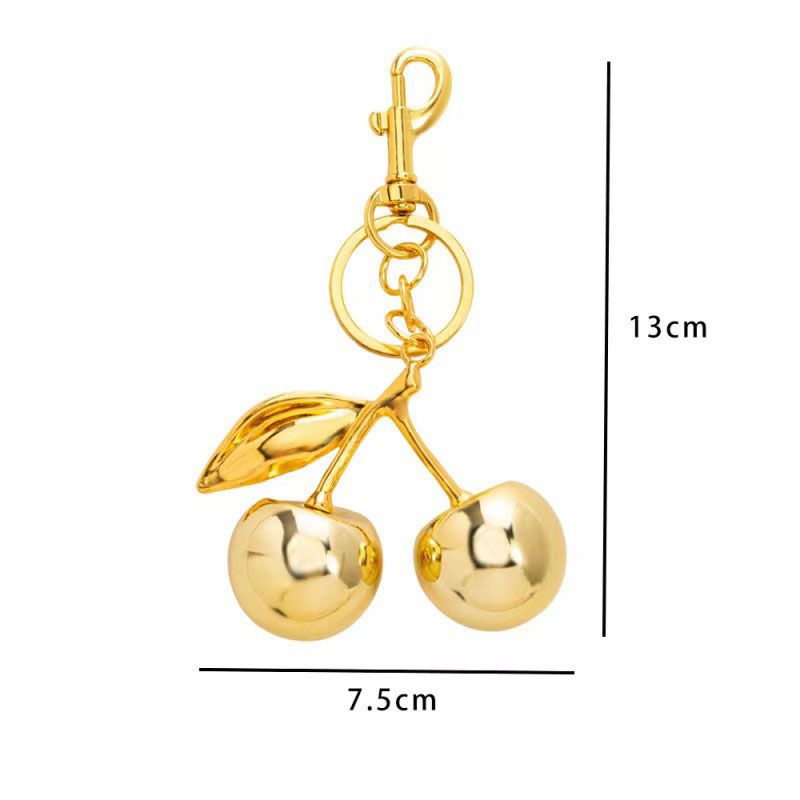 Golden Fashionable Cherry Keychain with Fruit Pendant for Handbags and Keys Stylish Accessory Solution for Local Trendsetters