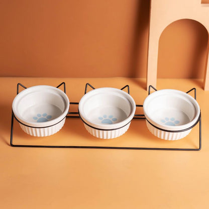 Triple Slanted Ceramic Pet Bowl Set with Elevated Iron Stand and Non Slip Base - 3 x 300ML Versatile Blue Cat Paw Print Pattern Dishes for Water & Food
