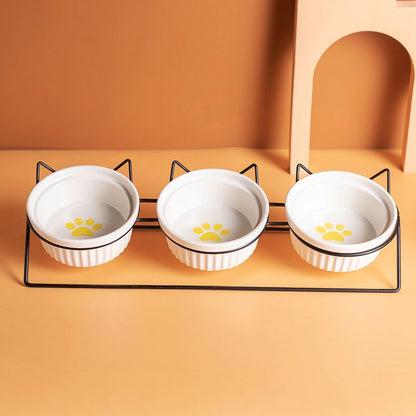 Triple Slanted Ceramic Pet Bowl Set with Elevated Iron Stand and Non Slip Base - 3 x 300ML Versatile Yellow Cat Paw Print Pattern Dishes for Water & Food