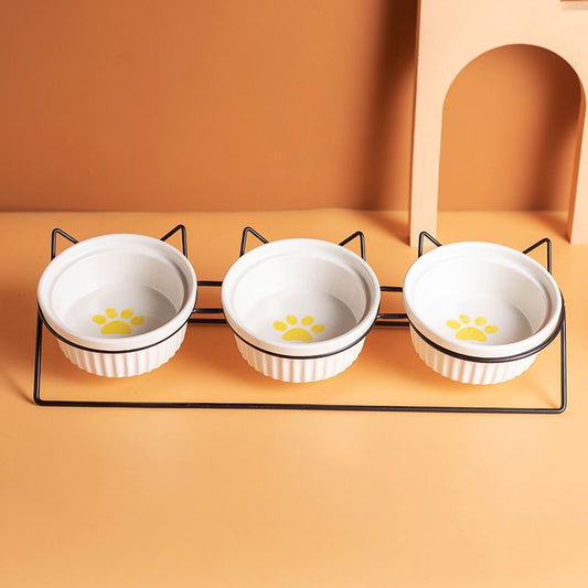 Triple Slanted Ceramic Pet Bowl Set with Elevated Iron Stand and Non Slip Base - 3 x 300ML Versatile Yellow Cat Paw Print Pattern Dishes for Water & Food