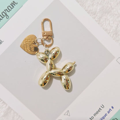 2-Piece Golden Balloon Dog Keychain Set with Heart Charm Bag Pendant Cute Couple Gift