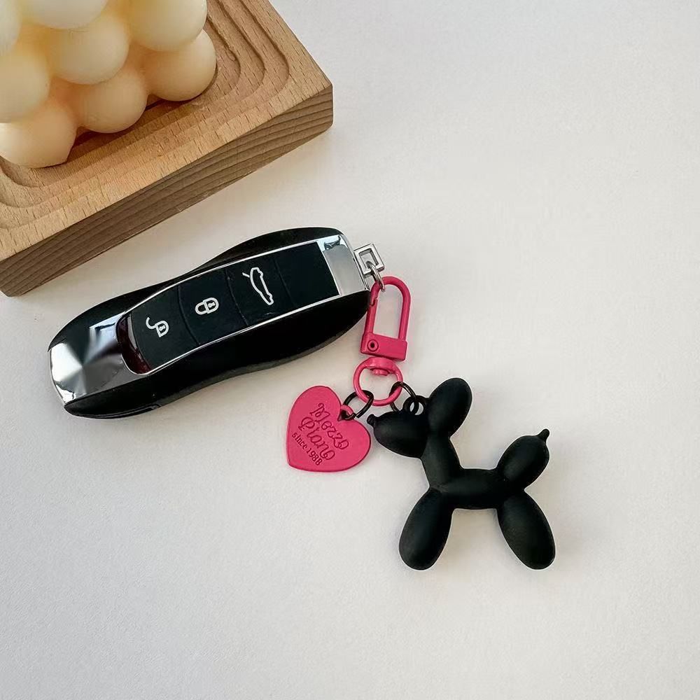 2-Piece Black Balloon Dog Keychain Set with Heart Charm Bag Pendant Cute Couple Gift