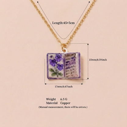 Vintage-style book necklace with February birthday flowers, a luxurious gold-plated bronze exquisite floral pendant gift